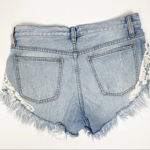 Free People Good Vibes Lace Hem Distressed Denim Shorts 27‎