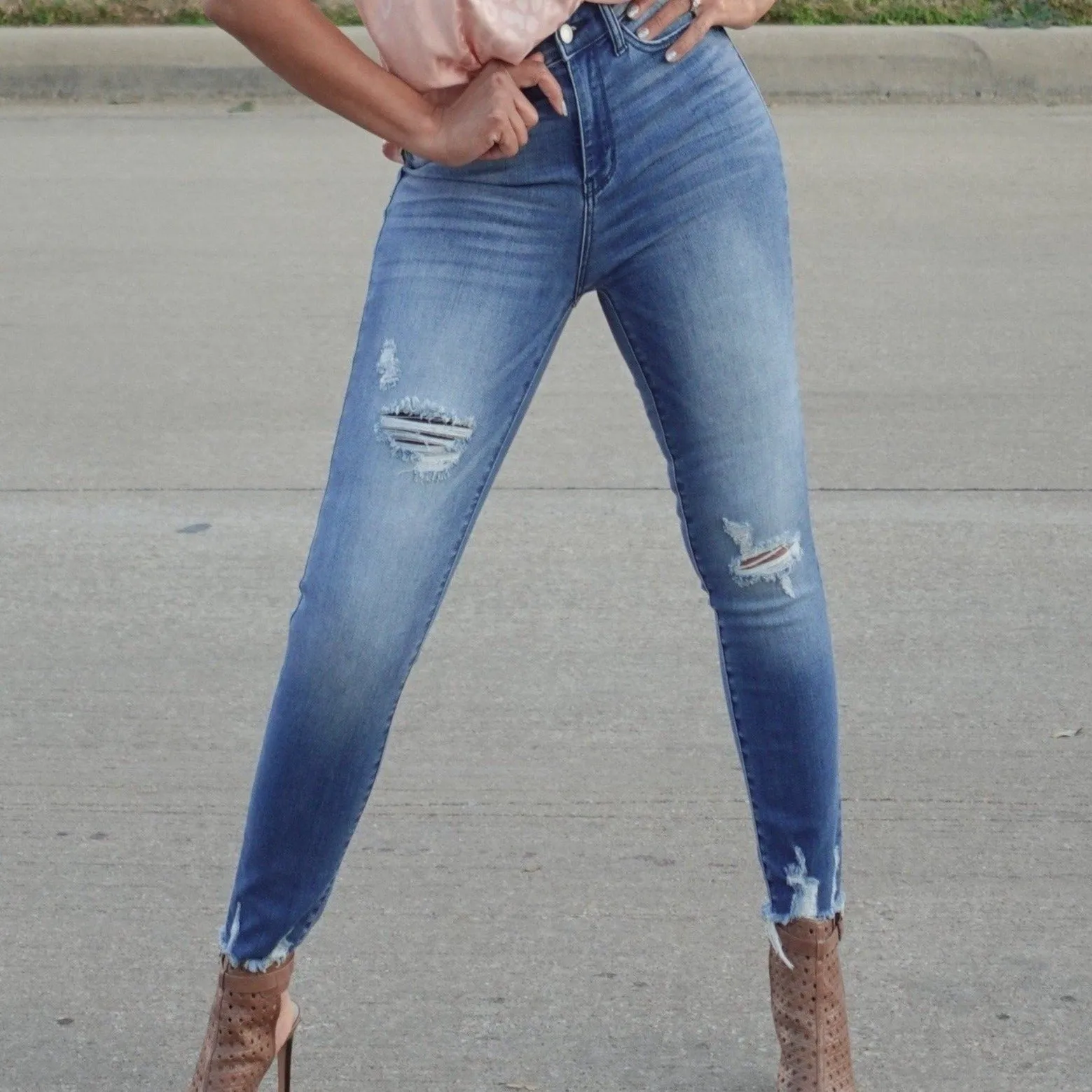High Rise Distressed Hem Skinny Jean