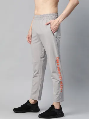 HRX by Hrithik Roshan Men Grey Solid Slim Fit Rapid-Dry Antimicrobial Running Track Pants